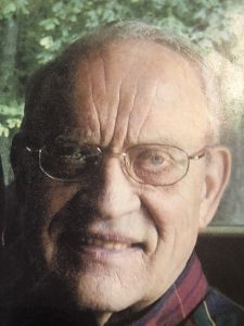 JOHN E. MORS